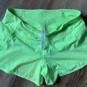 Neon Lululemon size 6 shorts 4 in inseam